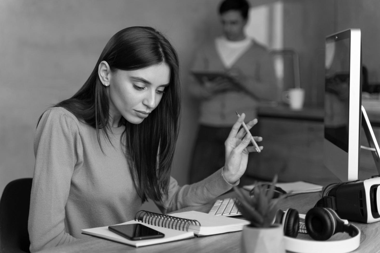 Financial analyst reviewing compliance documentation